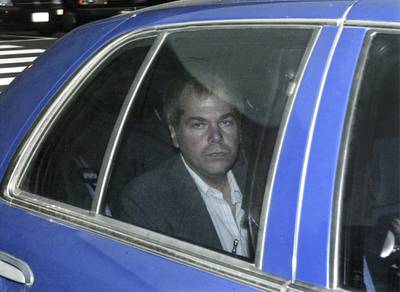 John Hinckley arrives at US District Court in Washington in 2003. At his 1982 trial, jurors found him not guilty by reason of insanity. AP