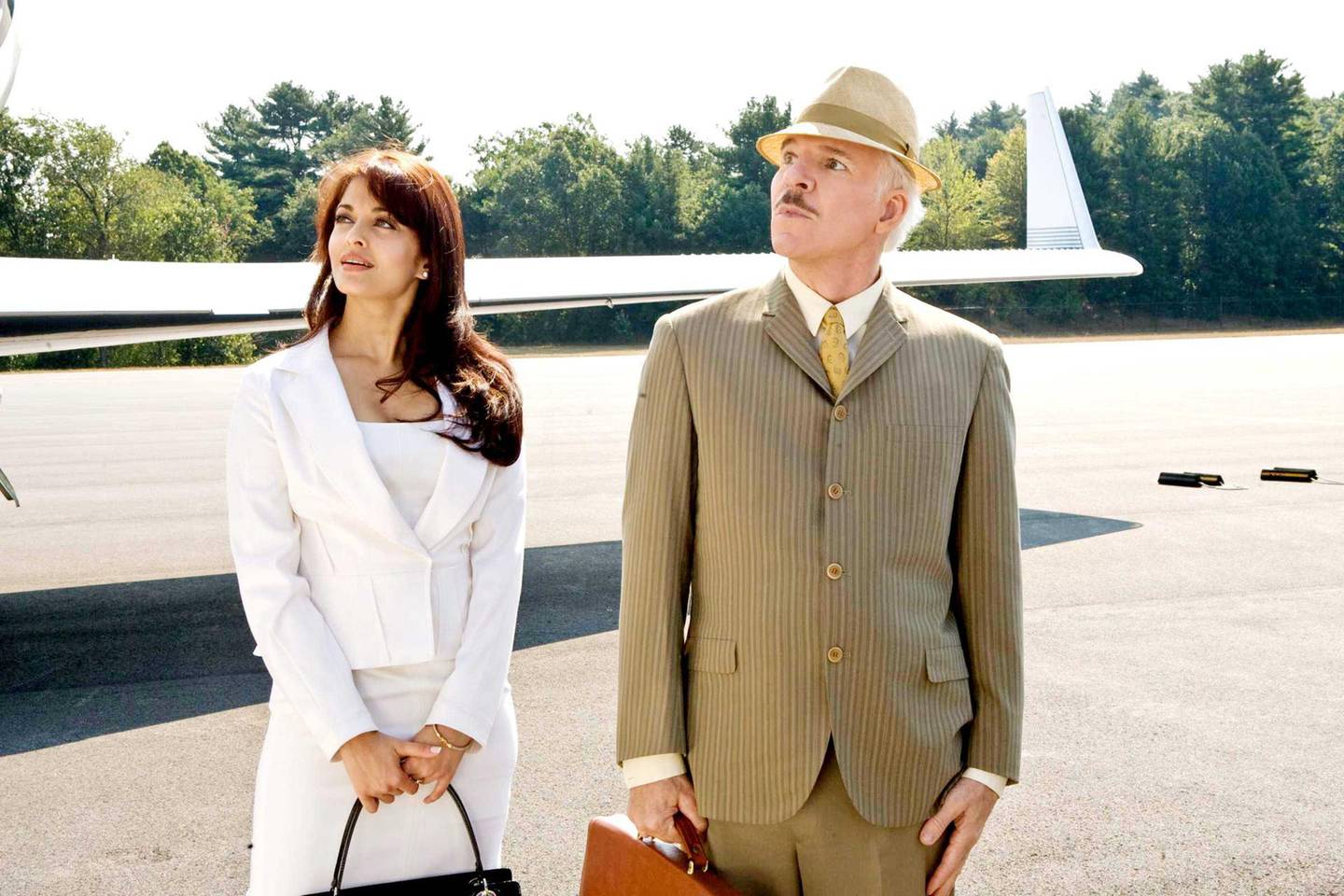 Aishwarya Rai stars as Sonia and Steve Martin stars as Inspector Jacques Clouseau in Columbia Pictures' The Pink Panther 2 (2009). Photo credit by Peter Iovino.
 *** Local Caption ***  al03au-Comedy Remakes-PinkPanther.jpg