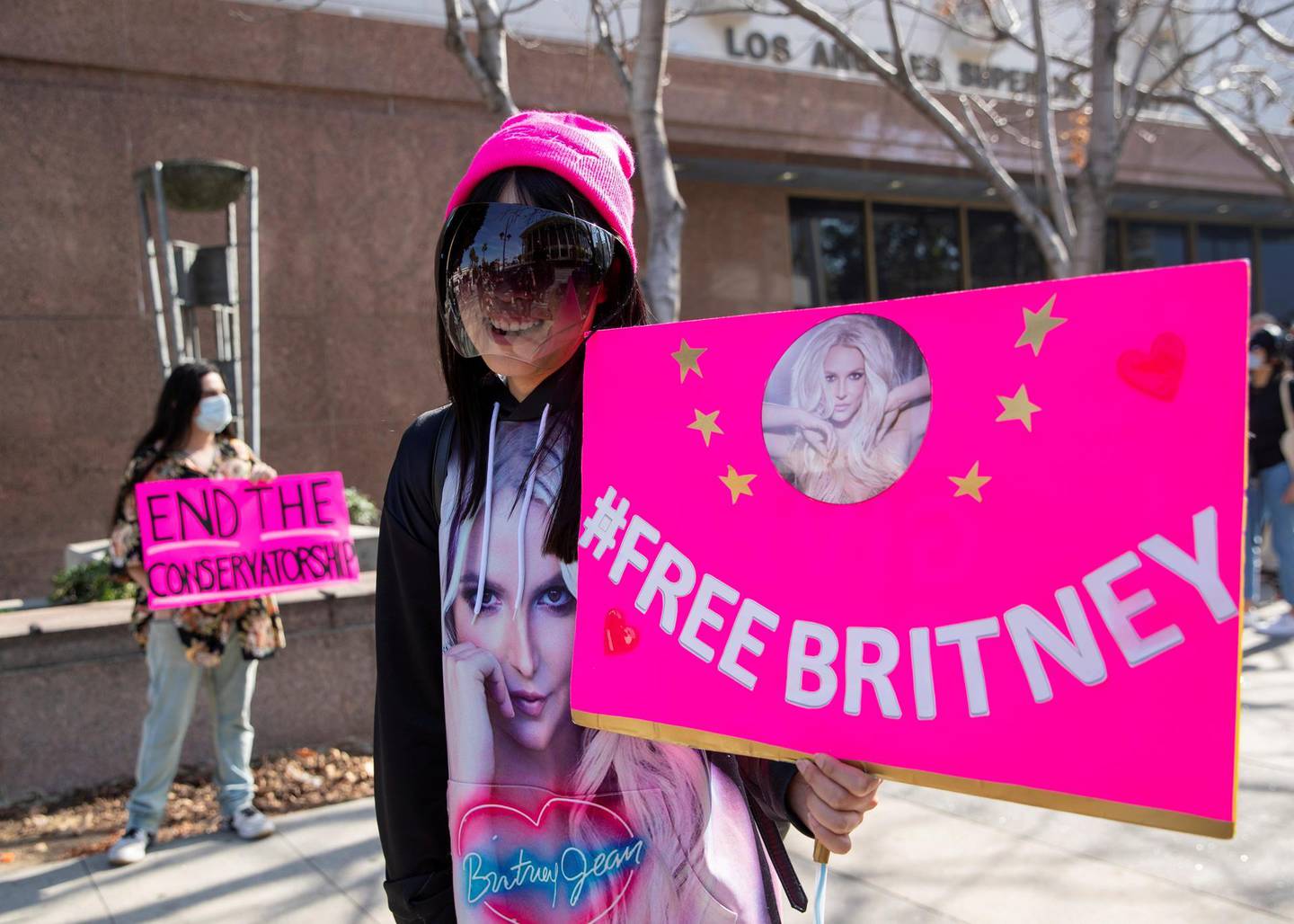 Supporters of singer Britney Spears gather outside a courthouse as a judge hears the singer's temporary conservatorship case during the outbreak of the coronavirus disease (COVID-19) in Los Angeles, California, U.S., February 11, 2021. REUTERS/Mike Blake     TPX IMAGES OF THE DAY