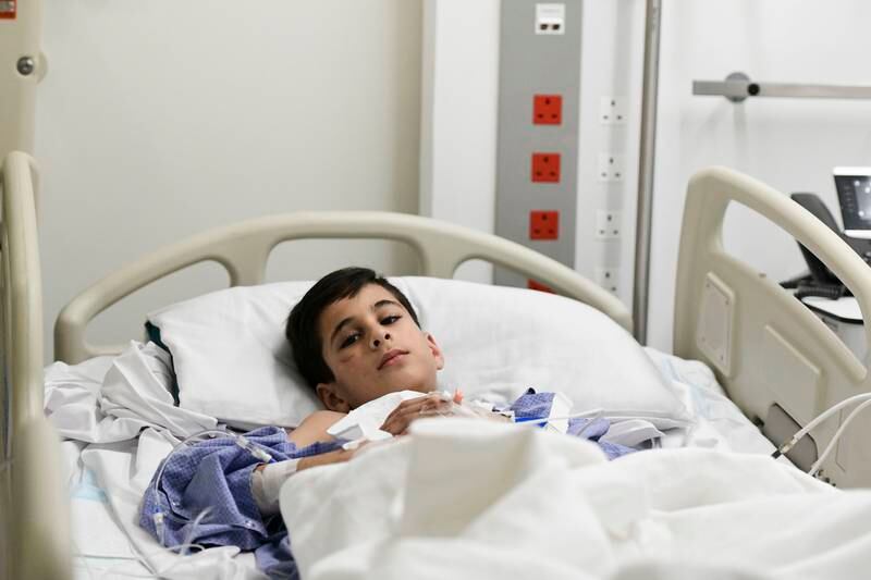 Eissa Shaheen, 10, at Sheikh Khalifa Medical City, Abu Dhabi. He is one of 10 Syrians receiving treatment in the UAE on the directives of Sheikha Fatima, Mother of the Nation. All photos: Khushnum Bhandari / The National 
