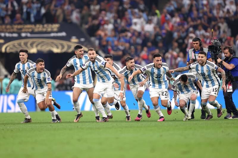 Argentina players celebrate after winning the World Cup final penalty shoot-out against France. Getty