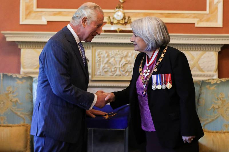 Britain's Prince Charles shakes hands with Canada's Governor General Mary Simon, while attending the Order of Military Merit Investiture Ceremony, on the second day of the Canadian 2022 Royal Tour, in Ottawa. Reuters