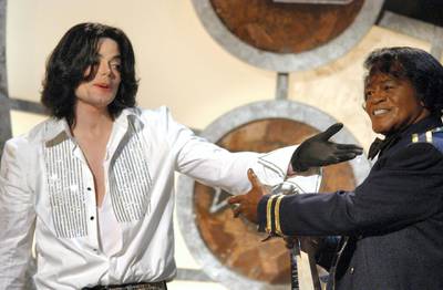 Michael Jackson gives James Brown his Lifetime Achievement Award (Photo by M. Caulfield/WireImage for BET Entertainment)
