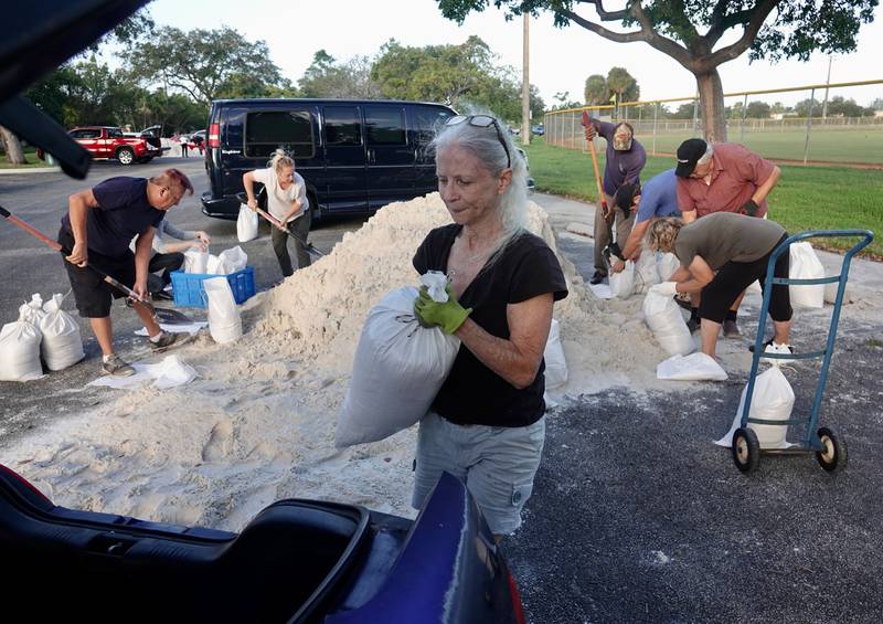 Sandbags are distributed at Mills Pond Park in Fort Lauderdale as Nicole approaches. AP