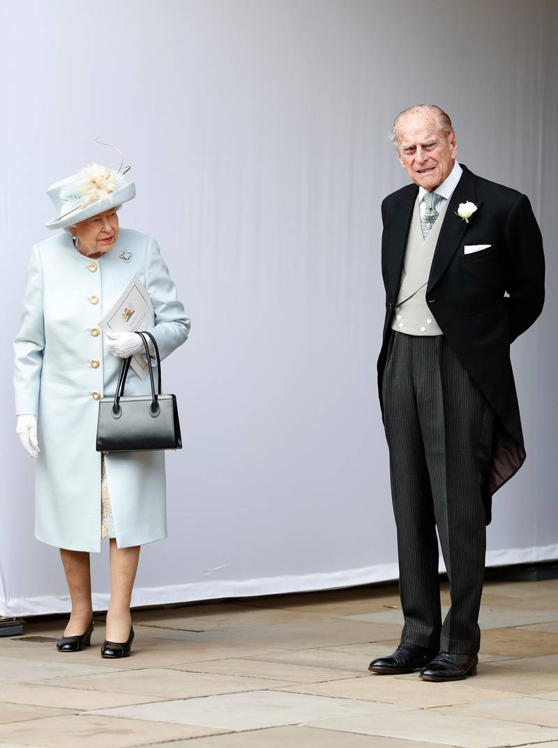 WINDSOR, ENGLAND - OCTOBER 12: Queen Elizabeth II and Prince Philip, Duke of Edinburgh look on after the wedding of Princess Eugenie of York and Mr. Jack Brooksbank at St. George's Chapel on October 12, 2018 in Windsor, England. (Photo by Alastair Grant - WPA Pool/Getty Images)