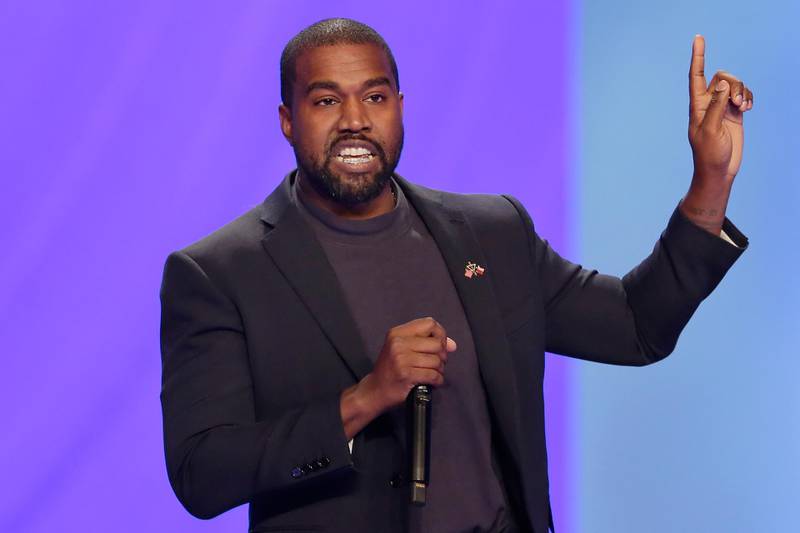 FILE - In this Sunday, Nov. 17, 2019, file photo, Kanye West answers questions during a service at Lakewood Church, in Houston. Staff for the Wisconsin Elections Commission are recommending that rapper Kanye West be kept off the battleground state's presidential ballot in November 2020 because he missed a deadline to submit nomination papers. (AP Photo/Michael Wyke, File)