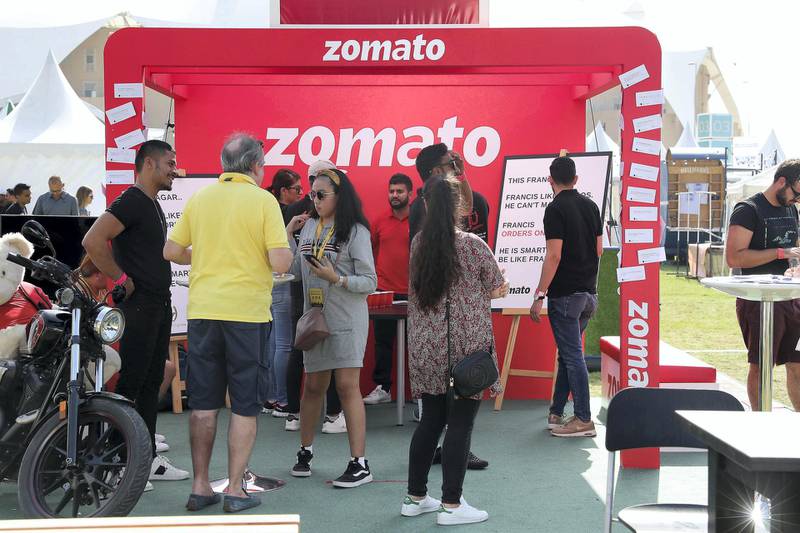 ABU DHABI , UNITED ARAB EMIRATES ,  November 9 , 2018 :- People at the Zomato stand during the Taste of Abu Dhabi held at Du Arena on Yas Island in Abu Dhabi.  ( Pawan Singh / The National )  For News/Online/Instagram