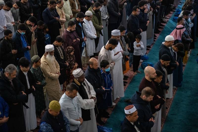 Men praying at a mosque in East London. Getty