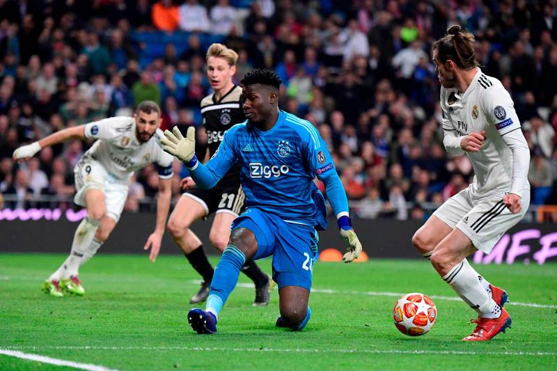 Real Madrid's Welsh forward Gareth Bale sees his shot saved by Ajax's Cameroonian goalkeeper Andre Onana. AFP