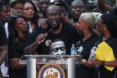 Philonise Floyd, brother of George Floyd, who died in Minneapolis police custody, is surrounded by family members as he speaks at a protest rally against his brother’s death, in Houston, Texas. Reuters