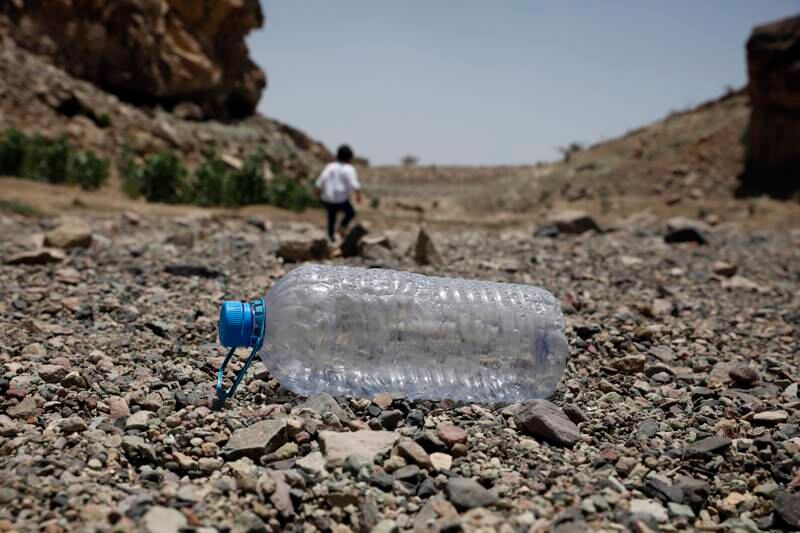 The dry bed of a drought-affected reservoir on the outskirts of Sanaa, Yemen. EPA