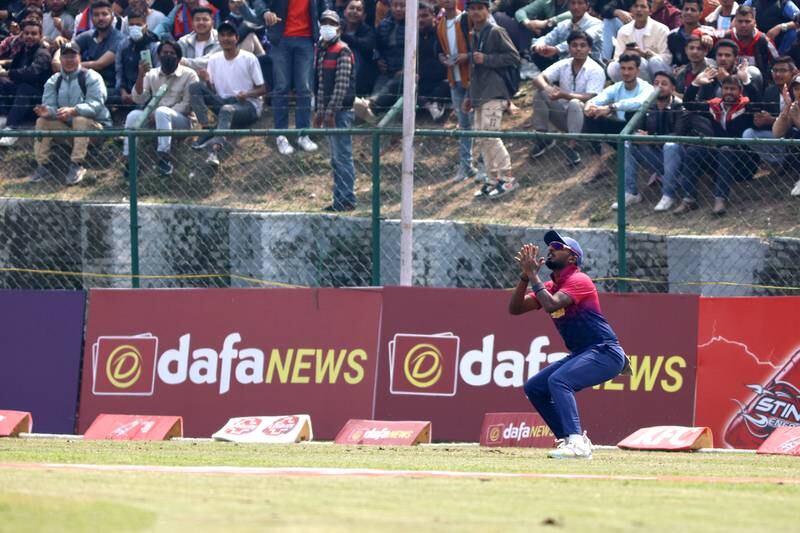 Karthik Meiyappan prepares for a catch during the ICC Cricket World Cup League 2 match between UAE and Nepal.