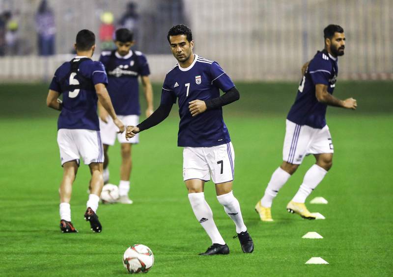 Iran's midfielder Masoud Shojaei (C) attends a training session as the team prepares for the 2019 edition of the AFC Asian cup, in Qatar's capital of Doha on December 21, 2018.  / AFP / KARIM JAAFAR
