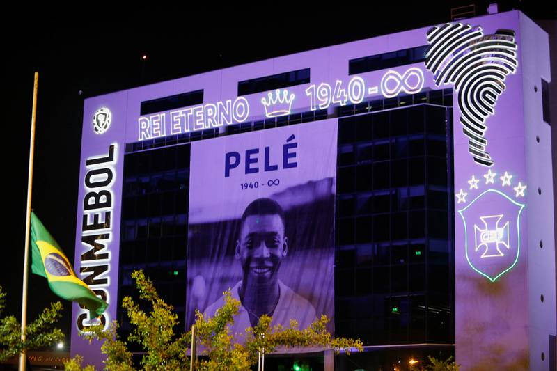 An image of Brazilian soccer legend Pele is projected on the South American Football Confederation (Conmebol) building, in Luque, Paraguay. Reuters