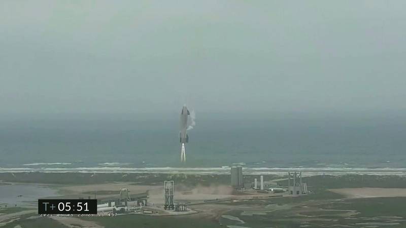 In this image from video made available by SpaceX, a starship test vehicle descends during a flight test in Boca Chica, Texas. AP Photo