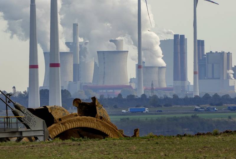 Steam rises from chimneys of a coal-fired power station in Germany. AP