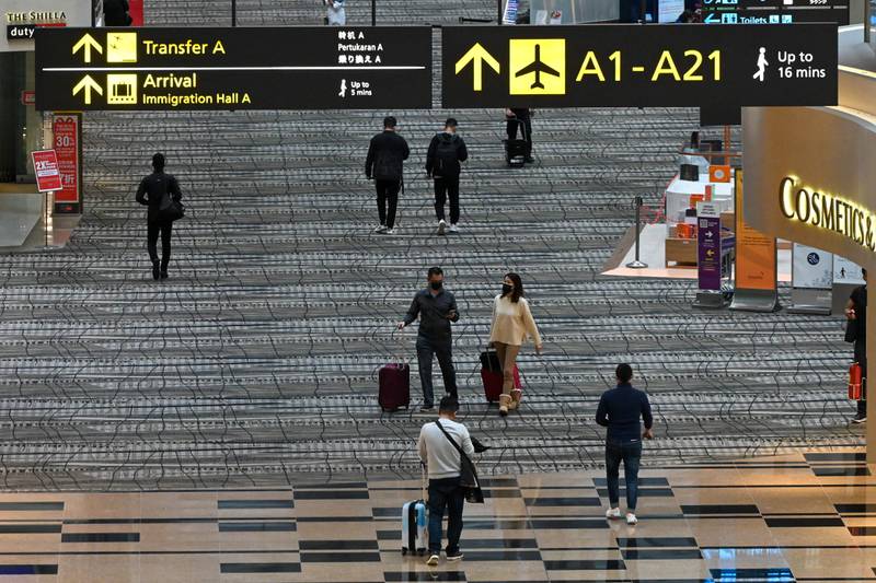 Singapore has suspended its Vaccinated Travel Lane until January 20. AFP