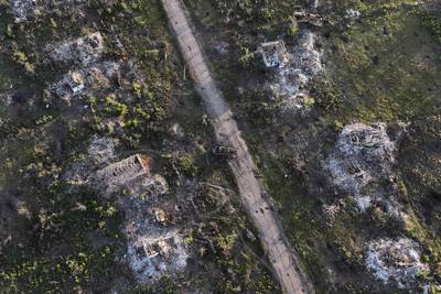 Houses and armoured vehicle destroyed during the fighting between Russian and Ukrainian armed forces in Klishchiivka, Donetsk region, Ukraine. AP