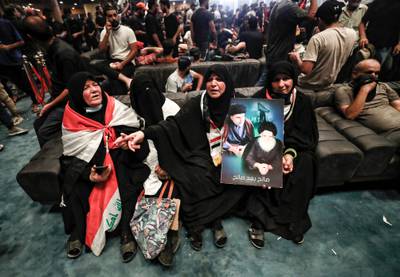 Supporters of cleric Moqtada Al Sadr, protesting against a rival bloc's nomination for prime minister, gather inside Iraq's parliament in Baghdad's high-security Green Zone. AFP