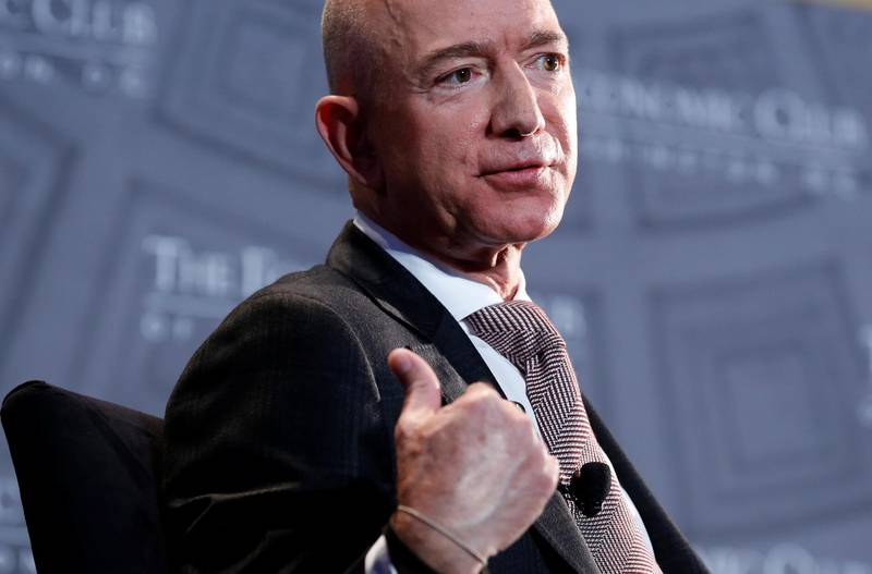 Jeff Bezos, president and CEO of Amazon and owner of The Washington Post, speaks at the Economic Club of Washington DC's "Milestone Celebration Dinner" in Washington, U.S., September 13, 2018.      REUTERS/Joshua Roberts