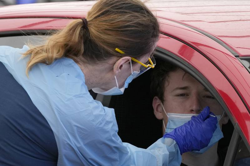 A swab is administered at a drive-through Covid-19 testing clinic at Bondi Beach, Sydney. AP