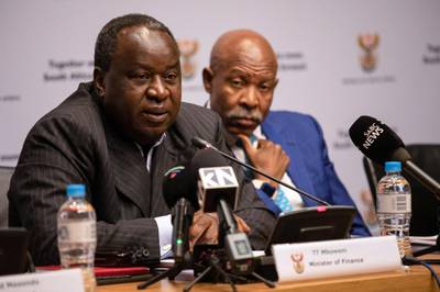 Tito Mboweni, South Africa's finance minister, left, speaks alongside Lesetja Kganyago, governor of South Africa's central bank (SARB), during a news conference before presenting his mid-term budget to parliament in Cape Town, South Africa, on Wednesday, Oct. 30, 2019. Mboweni has to tick many boxes in his medium-term budget: credible fiscal and debt numbers, plans to boost economic growth and policy steps that increase investor and business confidence. Photographer: Dwayne Senior/Bloomberg