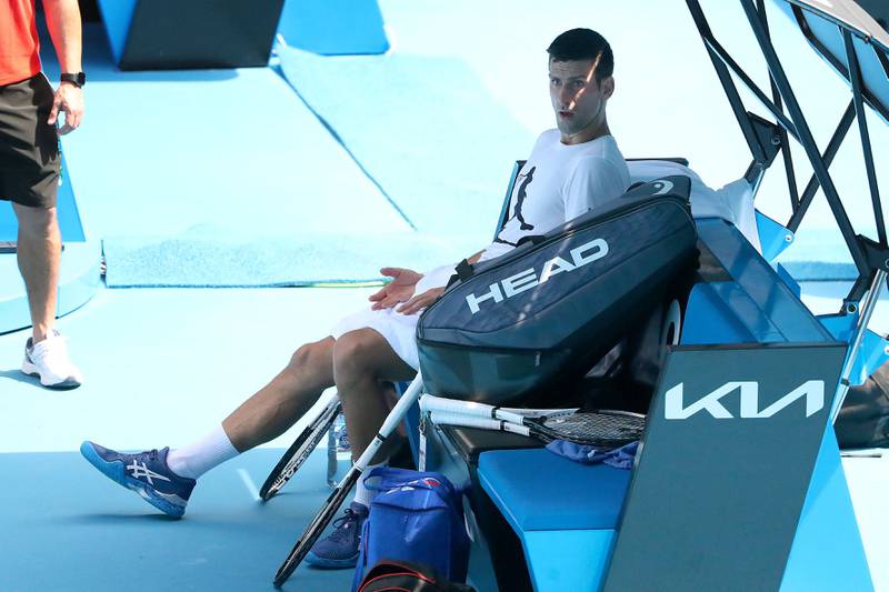 Novak Djokovic takes time out from training. AFP