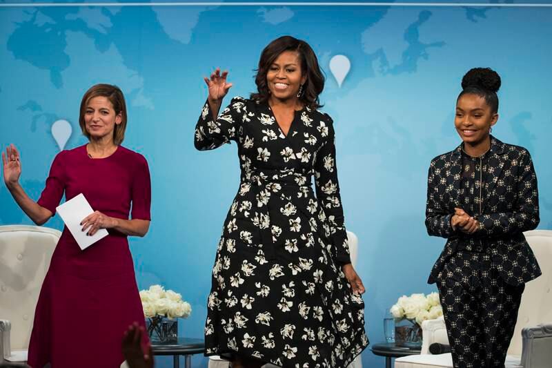 Yara Shahidi, in a printed pantsuit by Alberta Ferretti, with 'Glamour' editor Cindi Leive and former US first lady Michelle Obama during the A Brighter Future: A Global Conversation on Girls' Education conference in Washington on October 11, 2016. EPA