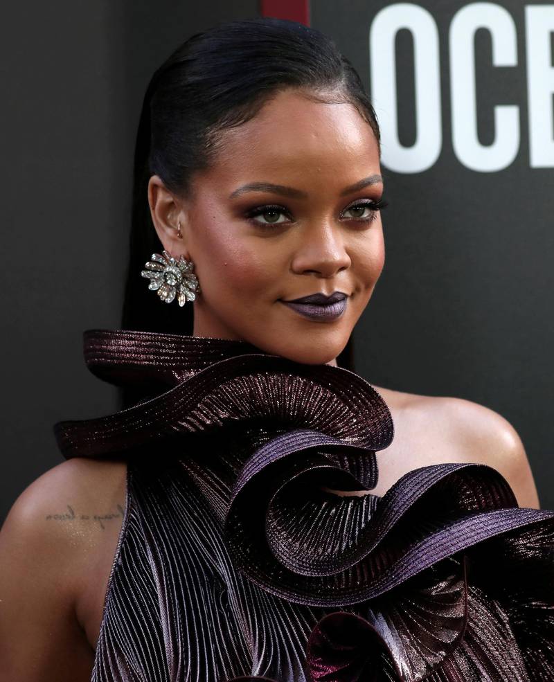 FILE PHOTO: Cast member Rihanna poses as she arrives at the world premiere of the film "Ocean's 8" at Alice Tully Hall in New York City, New York, U.S., June 5, 2018. REUTERS/Mike Segar/File Photo