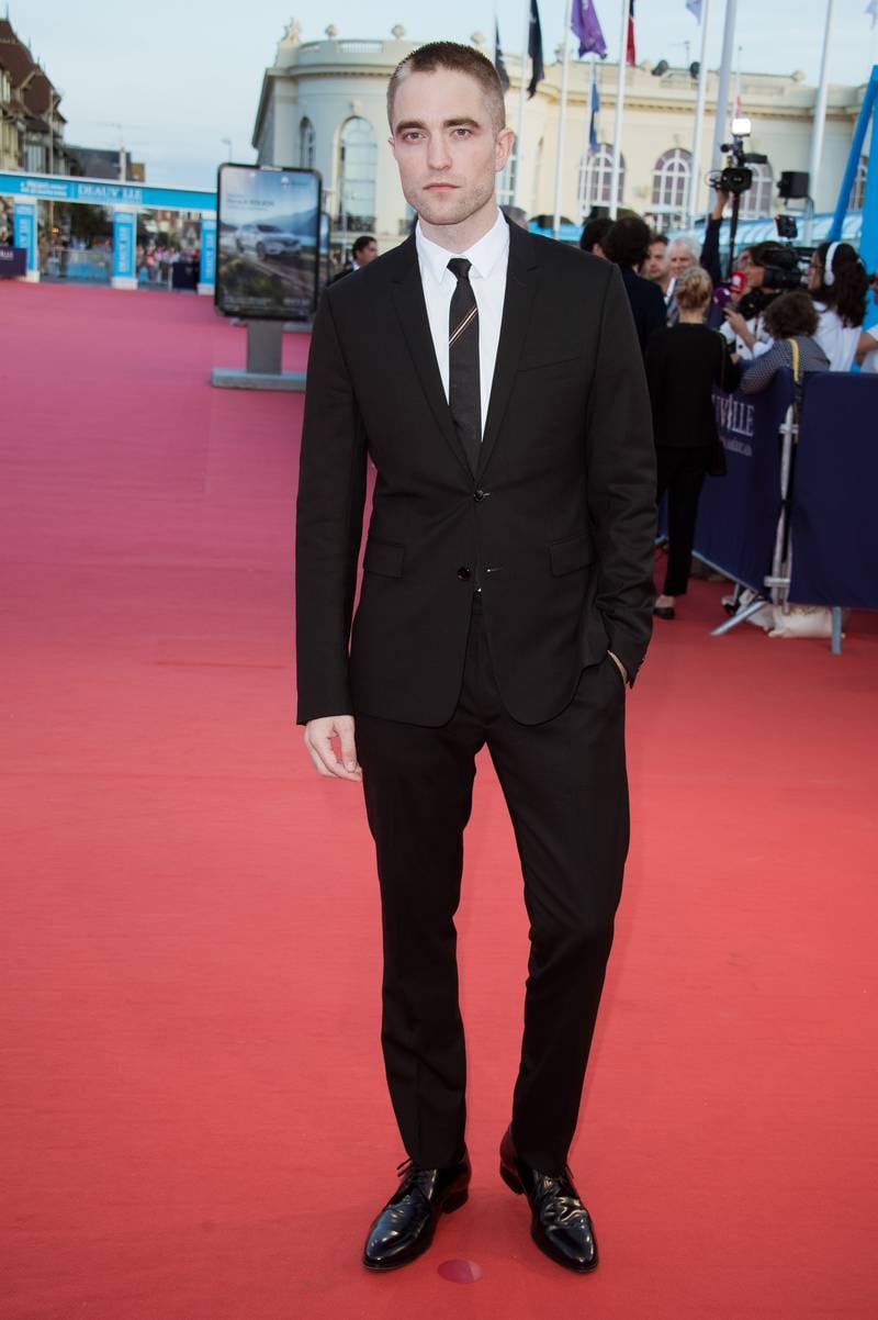 Robert Pattinson, in a sharp black suit, arrives for the screening of the film 'Good Time' during the 43rd Deauville American Film Festival on September 2, 2017. Getty Images