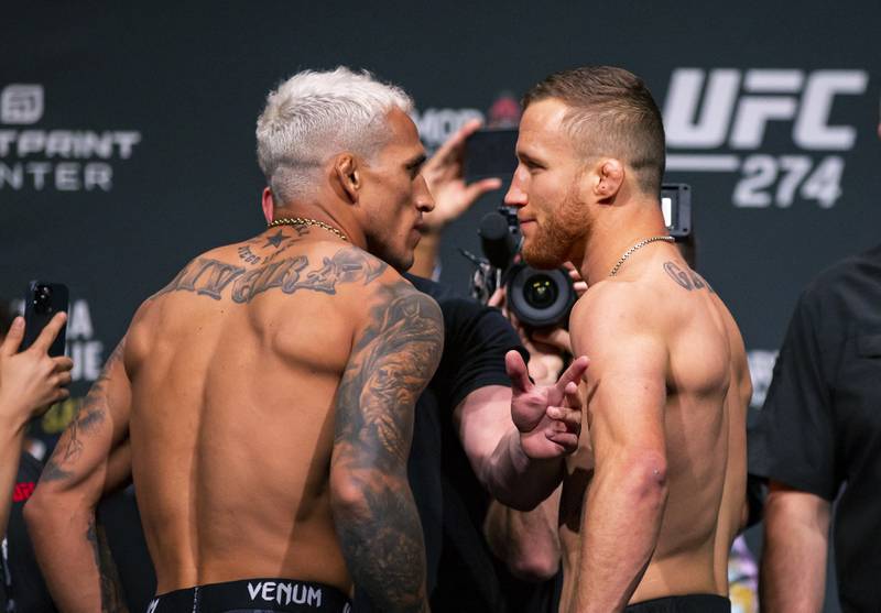 May 6, 2022; Phoenix, Arizona, USA; UFC fighter Charles Oliveira (left) faces off with Justin Gaethje during weigh ins for UFC 274 at the Arizona Federal Theatre.  Mandatory Credit: Mark J.  Rebilas-USA TODAY Sports
