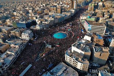 In this aerial photo released by an official website of the office of the Iranian supreme leader, mourners attend a funeral ceremony for Iranian Gen. Qassem Soleimani and his comrades, who were killed in Iraq in a U.S. drone strike on Friday, in Tehran, Iran, Monday, Jan. 6, 2020. The processions mark the first time Iran honored a single man with a multi-city ceremony. Not even Ayatollah Ruhollah Khomeini, who founded the Islamic Republic, received such a processional with his death in 1989. (Office of the Iranian Supreme Leader via AP)
