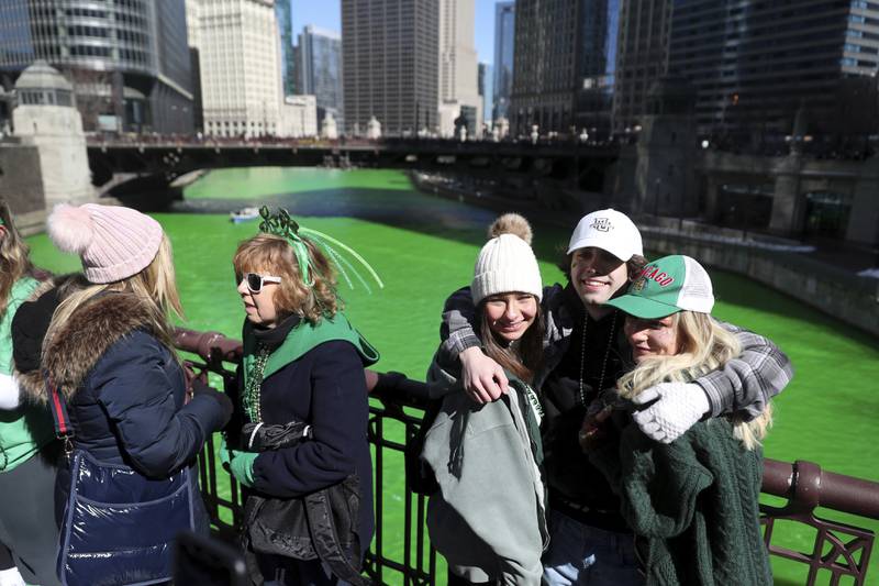 St Patrick's Day in the US: parade in New York City and green river in  Chicago