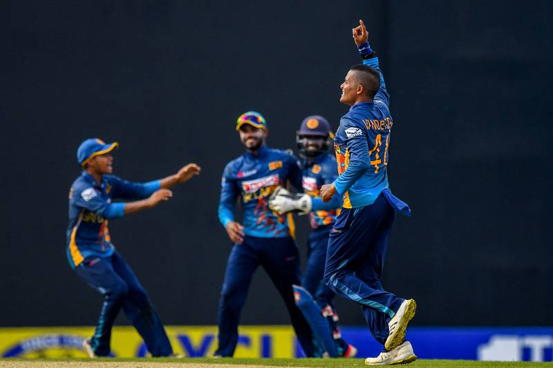 Sri Lanka's Jeffrey Vandersay, right, celebrates after taking the wicket of Australia's captain Aaron Finch. AFP