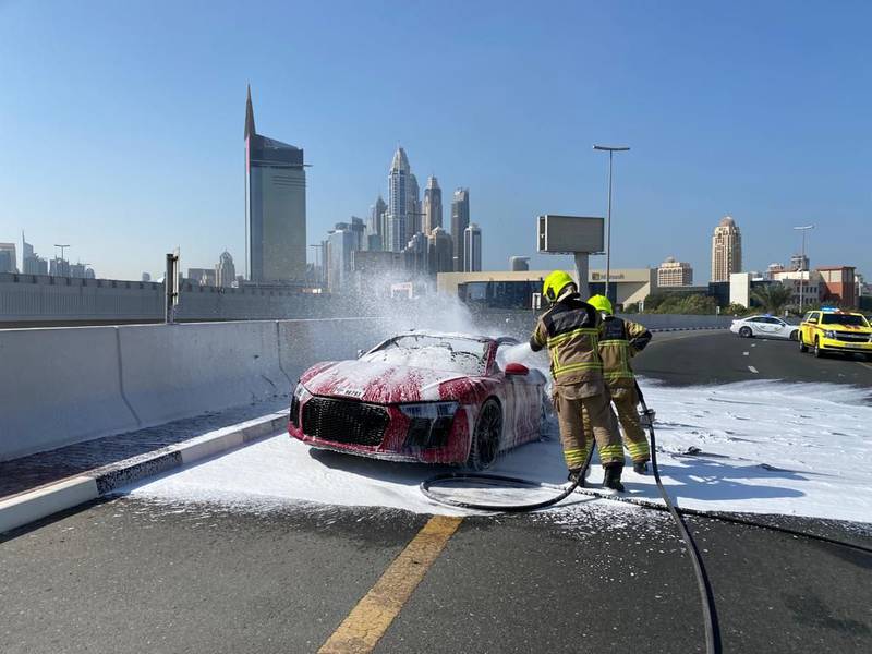 A car gutted by fire on Sheikh Zayed Road in Dubai. Cars can catch fire for a variety of reasons, but experts say as soon as there is even a hint of smoke, the driver and passengers should exit the vehicle as quickly and safely as possible. Photo: Dubai Civil Defence