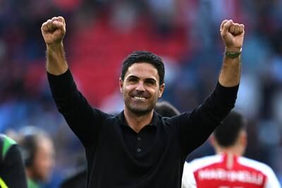 Arsenal manager Mikel Arteta celebrates following his team's victory in the penalty shoot-out. Getty 