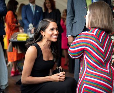 DUBLIN, IRELAND - JULY 10: Meghan, Duchess of Sussex chats with Sinead Burke, writer and advocate of fashion and disability rights during  a reception at Glencairn, the residence of Robin Barnett, the British Ambassador to Ireland during day one of their visit to Ireland on July 10, 2018 in Dublin, Ireland. (Photo by Geoff Pugh - WPA Pool/Getty Images)