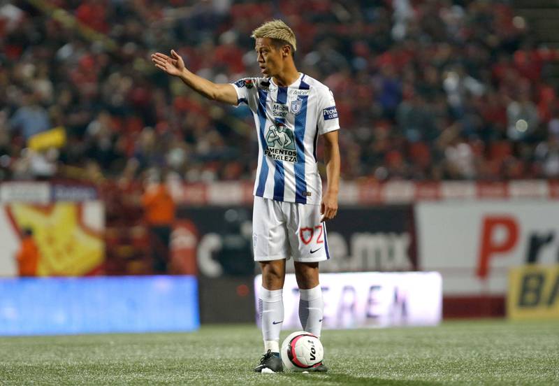 Pachuca`s midfielder Keisuke Honda of Japan gesticures during a Torneo Apertura 2017 Liga MX match against Tijuana at Caliente Stadium in Tijuana, Mexico on August 25, 2017. / AFP PHOTO / GUILLERMO ARIAS AND GUILLERMO ARIAS