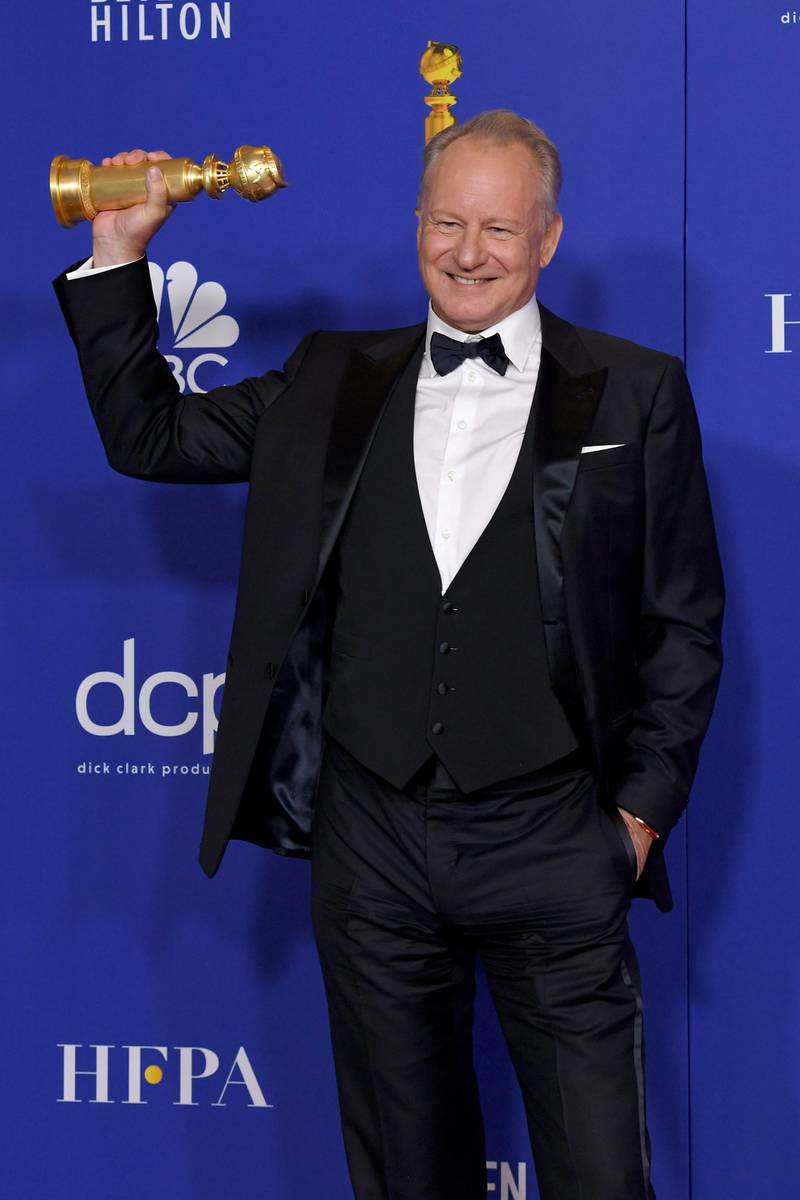 Stellan Skarsgard poses with his award for Best Performance by an Actor In a Supporting Role In a series, Limited Series or Motion Picture Made For Television for 'Chernobyl' during the 77th annual Golden Globe Awards on January 5, 2020, at The Beverly Hilton hotel in Beverly Hills, California. AFP