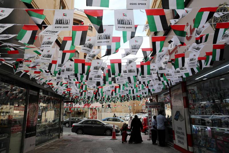 DUBAI , UNITED ARAB EMIRATES , November 28  – 2018 :- Market place in Bur Dubai decorated with UAE national flags for the National Day celebration in Dubai. ( Pawan Singh / The National ) For News. 