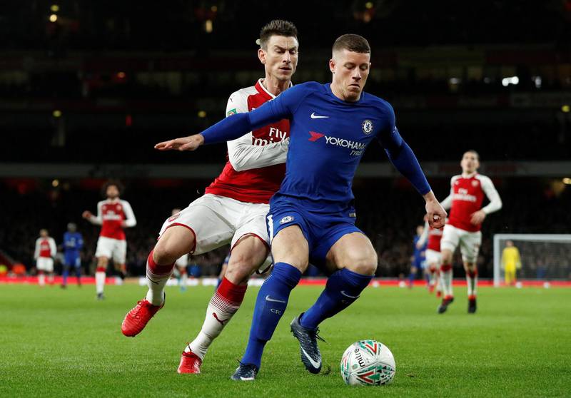 Soccer Football - Carabao Cup Semi Final Second Leg - Arsenal vs Chelsea - Emirates Stadium, London, Britain - January 24, 2018   Chelsea’s Ross Barkley in action with Arsenal's Laurent Koscielny    Action Images via Reuters/John Sibley    EDITORIAL USE ONLY. No use with unauthorized audio, video, data, fixture lists, club/league logos or "live" services. Online in-match use limited to 75 images, no video emulation. No use in betting, games or single club/league/player publications. Please contact your account representative for further details.