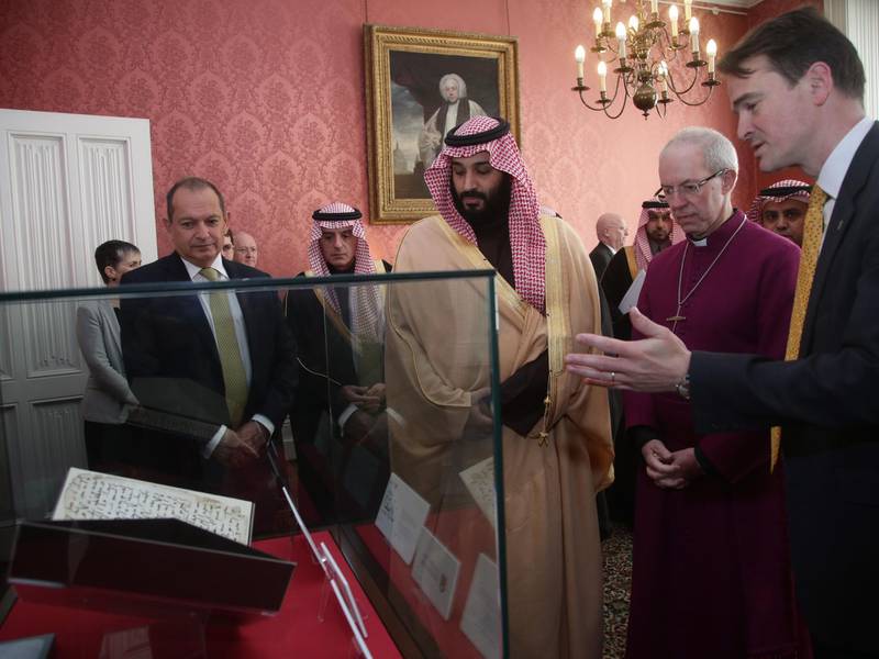 Saudi Arabia's Crown Prince Mohammed bin Salman views The Birmingham Quran during a private meeting at Lambeth Palace in London with UK's Archbishop of Canterbury Justin Welby.  All photos by Yui Mok / Reuters