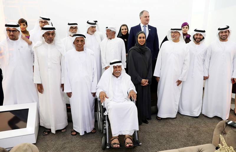 ABU DHABI ,  UNITED ARAB EMIRATES , May 21 – 2019 :- Jaber Salem Alhammadi (90 years old) from Abu Dhabi ( on the wheel chair ) posing for the photo with others senior Emiraties and officials during the launch of Senior Emiratis Basma Programme held at Etihad innovation centre in Abu Dhabi. ( Pawan Singh / The National ) For News. Story by Shareena