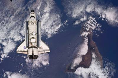 The Space Shuttle Atlantis is backdropped against the Earth prior to docking with the International Space Station in this handout photo provided by NASA and taken May 16, 2010. Photo taken May 16, 2010.     REUTERS/NASA/Handout   (UNITED STATES - Tags: SCI TECH) FOR EDITORIAL USE ONLY. NOT FOR SALE FOR MARKETING OR ADVERTISING CAMPAIGNS *** Local Caption ***  HOU09_NASA-_0518_11.JPG