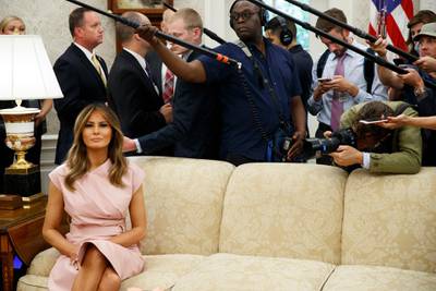 First lady Melania Trump listens to US President Donald Trump speak during a meeting with King Abdullah II of Jordan and Queen Rania in the Oval Office of the White House. AP