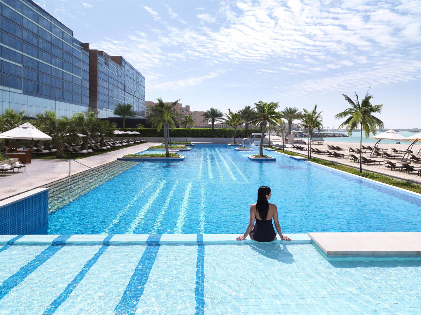 Fairmont Bab Al Bahr offers poolside lounging and Khor Al Maqta views. Photo: DCT Abu Dhabi