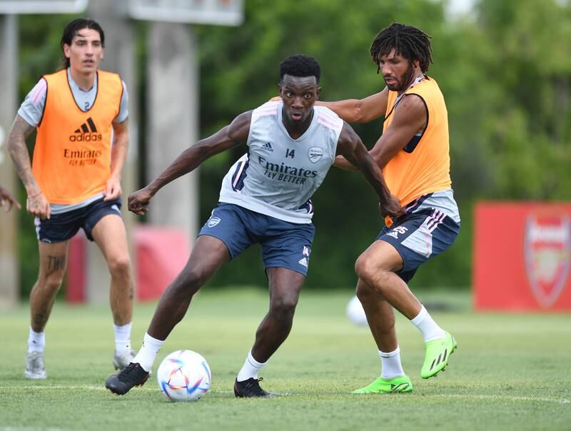 Arsenal striker Eddie Nketiah under pressure from Mohamed Elneny during training in Orlando, Florida.
