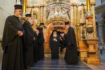 The Greek Orthodox Patriarch of Jerusalem Theophilos III performed a prayer for peace at the Church of the Holy Sepulchre in Jerusalem. Willy Lowry / The National