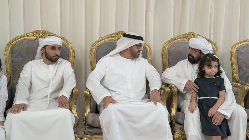 FUJAIRAH, UNITED ARAB EMIRATES - September 30, 2017: HH Sheikh Mohamed bin Zayed Al Nahyan Crown Prince of Abu Dhabi Deputy Supreme Commander of the UAE Armed Forces (C), offers condolences to the family of martyr Captain Pilot Khalid Mohammad Al Shehi, who passed away while serving with the UAE Armed Forces in Yemen.( Mohamed Al Hammadi / Crown Prince Court - Abu Dhabi )---