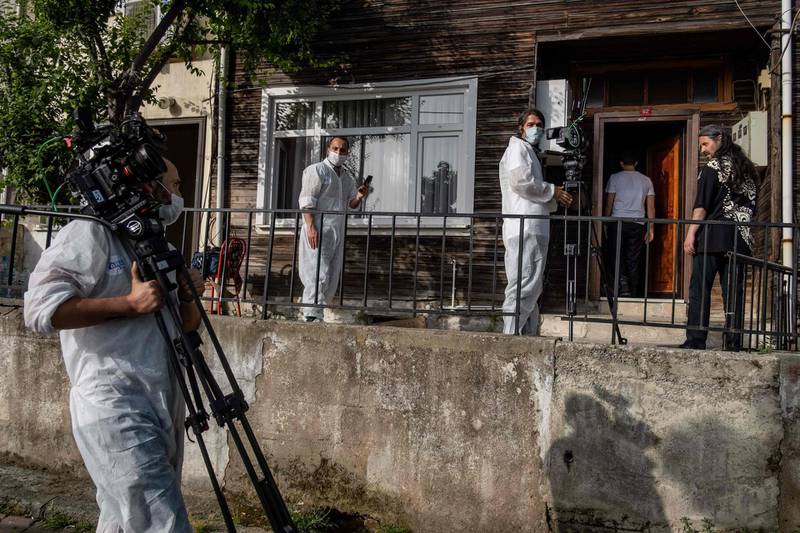Members of the Tutunamayanlar's team (The Outcasts) and Turkish actor Dogu Demirkol  prepare to record an episode, in Beykoz, in the outskirts of Istanbul.  Turkey is known for its obsession with TV dramas -- which are also a massive export success -- and not even the coronavirus restrictions stopped the team on Tutunamayanlar (The Outcasts) from keeping the show going.  AFP